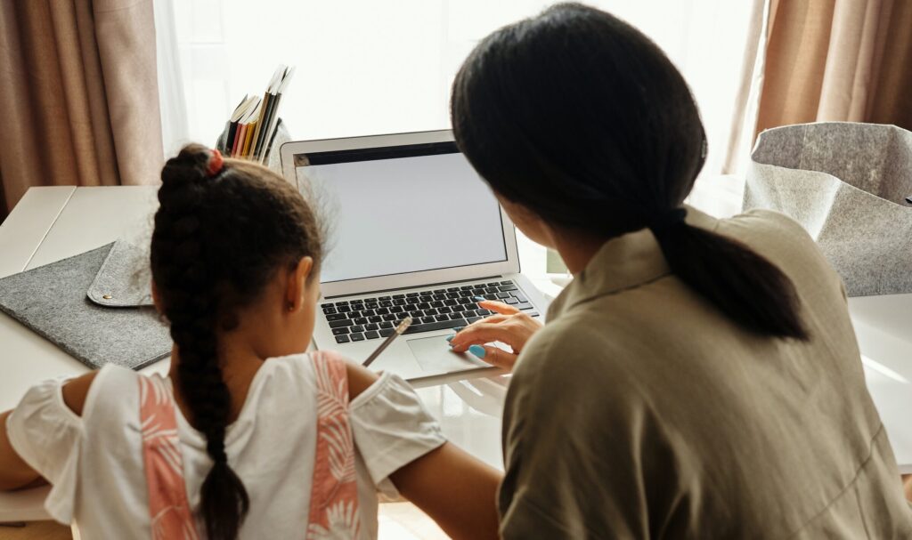 https://www.pexels.com/photo/girl-holding-pencil-while-looking-at-imac-4144223/
